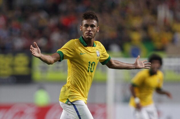 SEOUL, SOUTH KOREA - OCTOBER 12:  Neymar of Brazil celebrates after scoring a goal during the international friendly match between South Korea and Brazil at the Sangam World Cup Stadium on October 12, 2013 in Seoul, South Korea.  (Photo by Chung Sung-Jun/Getty Images)