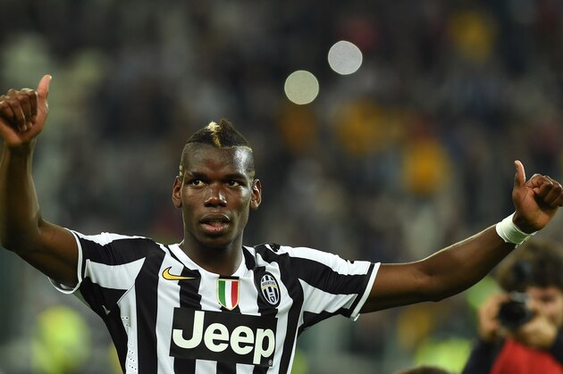 TURIN, ITALY - MAY 05:  Paul Pogba of Juventus celebrates after beating Atalanta BC 1-0 to win the Serie A Championships at the end of the Serie A match between Juventus and Atalanta BC at Juventus Arena on May 5, 2014 in Turin, Italy.  (Photo by Valerio Pennicino/Getty Images)