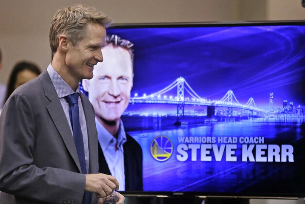 Golden State Warriors coach Steve Kerr arrives for a news conference Tuesday, May 20, 2014, in Oakland, Calif.  Kerr plans to finish his duties broadcasting the Western Conference finals for TNT before starting with the Warriors.(AP Photo/Ben Margot)