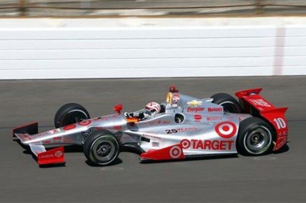 Tony Kanaan, of Brazil, heads into the first turn on the final day of practice for the Indianapolis 500 IndyCar auto race at the Indianapolis Motor Speedway in Indianapolis, Friday, May 23, 2014. The 98th running of the Indianapolis 500 is Sunday. (AP Photo/Tom Strattman)