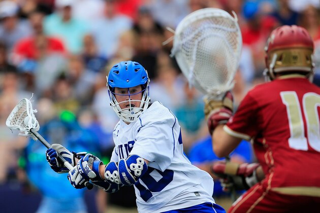 BALTIMORE, MD - MAY 24: Kyle Keenan #16 of the Duke Blue Devils takes a shot and scores a goal on goalie Ryan LaPlante #10 of the Denver Pioneers during the first half of the semifinals of the 2014 NCAA Division I Men's Lacrosse Championship at M&T Bank Stadium on May 24, 2014 in Baltimore, Maryland.  (Photo by Rob Carr/Getty Images)