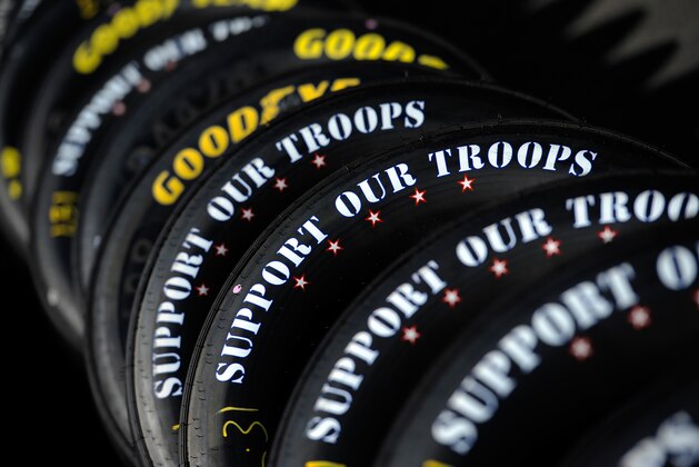CHARLOTTE, NC - MAY 24:  A detailed view of tires reading 'support our troops' in the garage area during practice for the NASCAR Sprint Cup Series Coca-Cola 600 at Charlotte Motor Speedway on May 24, 2014 in Charlotte, North Carolina.  (Photo by Jared C. Tilton/Getty Images)