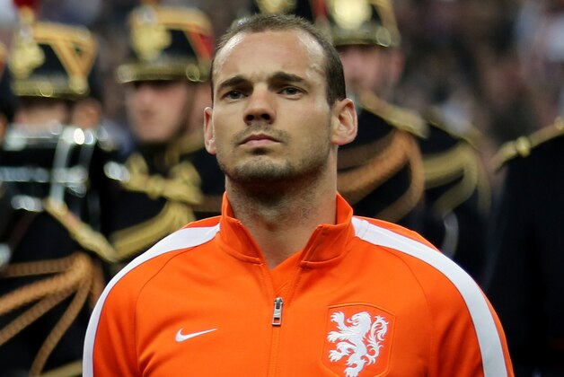 Netherlands player Wesley Sneijder poses before the friendly soccer match between France and Netherlands at the Stade de France in Saint Denis, north of Paris, Wednesday March 5, 2014.(AP Photo/Remy de la Mauviniere)