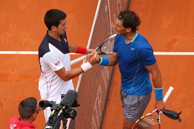 ROME, ITALY - MAY 18:  Rafael Nadal of Spain congratulates Novak Djokovic of Serbia after winning in the final during day eight of the Internazionali BNL d'Italia tennis 2014 on May 18, 2014 in Rome, Italy.  (Photo by Julian Finney/Getty Images)