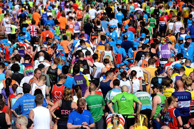 LONDON, ENGLAND - APRIL 13:  A general view as competitors make their way down the mall during the Virgin Money London Marathon on April 13, 2014 in London, England.  (Photo by Tom Dulat/Getty Images)
