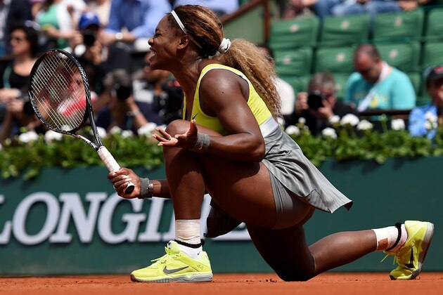 PARIS, FRANCE - MAY 25:  Serena Williams of the United States reacts during her women's singles match against Alize Lim of France on day one of the French Open at Roland Garros on May 25, 2014 in Paris, France.  (Photo by Matthias Hangst/Getty Images)