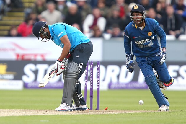 CHESTER-LE-STREET, ENGLAND - MAY 25:  Ravi Bopara of England is bowled by Sachithra Senanayake of Sri Lanka with Kumar Sangakkara of Sri Lanka looking on during the 2nd Royal London One Day International match between England and Sri Lanka at The Riverside on May 25, 2014 in Chester-le-Street, England. (Photo by Jan Kruger/Getty Images)