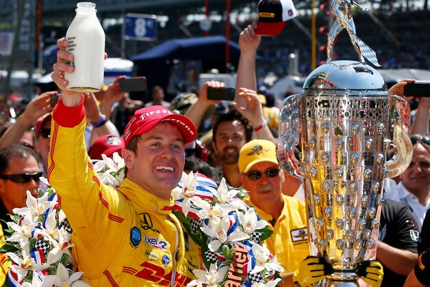 INDIANAPOLIS, IN - MAY 25:  Ryan Hunter-Reay, driver of the #28 DHL Andretti Autosport Honda Dallara, celebrates in Victory Lane with milk after winning the 98th running of the Indianapolis 500 at Indianapolis Motorspeedway on May 25, 2014 in Indianapolis, Indiana.  (Photo by Jonathan Ferrey/Getty Images)