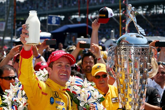 INDIANAPOLIS, IN - MAY 25:  Ryan Hunter-Reay, driver of the #28 DHL Andretti Autosport Honda Dallara, celebrates in Victory Lane with milk after winning the 98th running of the Indianapolis 500 at Indianapolis Motorspeedway on May 25, 2014 in Indianapolis, Indiana.  (Photo by Jonathan Ferrey/Getty Images)