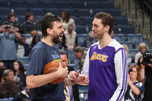 MEMPHIS, TN - FEBRUARY 26: Marc Gasol #33 of the Memphis Grizzlies laughs with brother Pau Gasol #16 of the Los Angeles Lakers on February 26, 2014 at FedExForum in Memphis, Tennessee. NOTE TO USER: User expressly acknowledges and agrees that, by downloading and or using this photograph, User is consenting to the terms and conditions of the Getty Images License Agreement. Mandatory Copyright Notice: Copyright 2014 NBAE (Photo by Joe Murphy/NBAE via Getty Images)