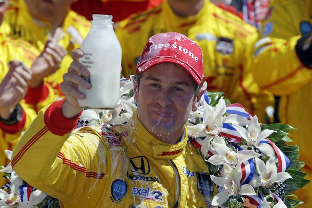 Ryan Hunter-Reay celebrates after winning the 98th running of the Indianapolis 500 IndyCar auto race at the Indianapolis Motor Speedway in Indianapolis, Sunday, May 25, 2014. (AP Photo/Michael Conroy)