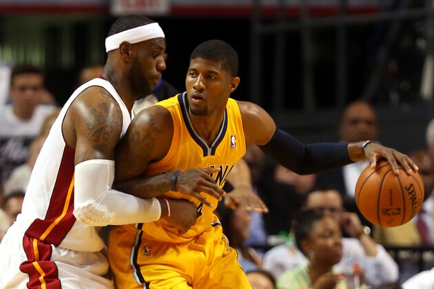 MIAMI, FL - MAY 24:  Paul George #24 of the Indiana Pacers drives to the basket against LeBron James #6 of the Miami Heat during Game Three of the Eastern Conference Finals of the 2014 NBA Playoffs  at American Airlines Arena on May 24, 2014 in Miami, Florida.  (Photo by Mike Ehrmann/Getty Images)