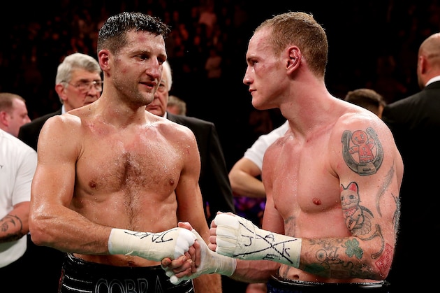 MANCHESTER, ENGLAND - NOVEMBER 23:  Carl Froch shakes hands with George Groves during their IBF and WBA World Super Middleweight bout at Phones4u Arena on November 23, 2013 in Manchester, England.  (Photo by Scott Heavey/Getty Images)