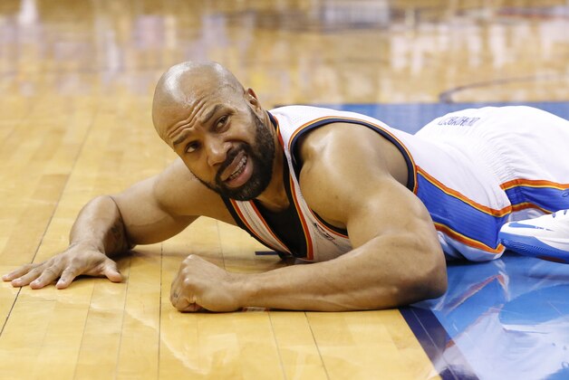Oklahoma City Thunder guard Derek Fisher (6) lies on the court after a foul in the fourth quarter of Game 2 of the Western Conference semifinal NBA basketball playoff series against the Los Angeles Clippers in Oklahoma City, Wednesday, May 7, 2014. Oklahoma City won 112-101. (AP Photo/Sue Ogrocki)