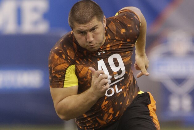 Cornell offensive lineman J C Tretter runs a drill during the NFL football scouting combine in Indianapolis, Saturday, Feb. 23, 2013. (AP Photo/Dave Martin)