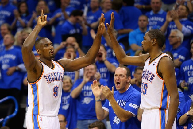 OKLAHOMA CITY, OK - MAY 25: Serge Ibaka #9 and Kevin Durant #35 of the Oklahoma City Thunder celebrate late in the second half against the San Antonio Spurs during Game Three of the Western Conference Finals of the 2014 NBA Playoffs at Chesapeake Energy Arena on May 25, 2014 in Oklahoma City, Oklahoma.  (Photo by Ronald Martinez/Getty Images)