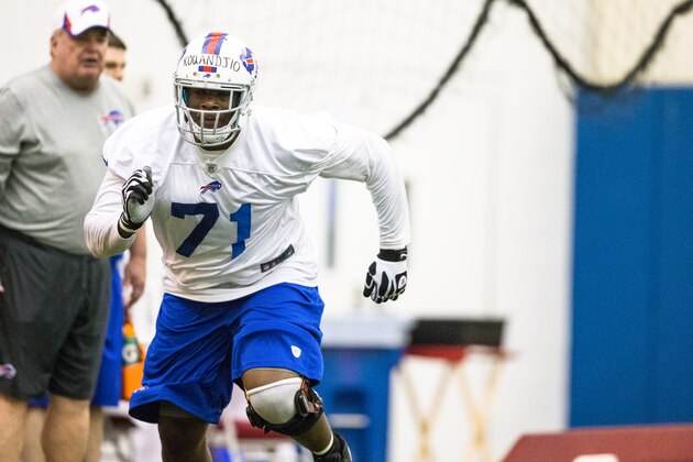 ORCHARD PARK, NY - May 18:  Cyrus Kouandjio #71 of Buffalo Bills takes part in drills during the Buffalo Bills rookie minicamp on May 18, 2014 at Ralph Wilson Stadium in Orchard Park, New York.  (Photo by Brett Carlsen/Getty Images)