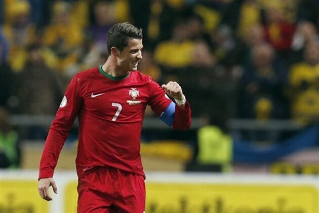 FILE - In this Nov.19, 2013, file photo, shows  Portugal's Cristiano Ronaldo during the World Cup qualifying playoff second leg soccer match between Sweden and Portugal in Stockholm, Sweden. (AP Photo/Frank Augstein)