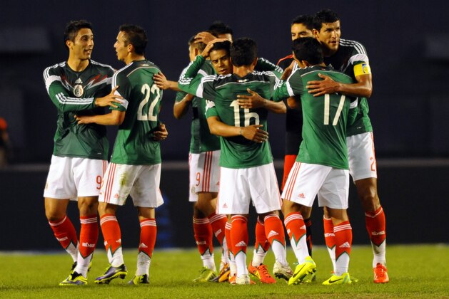 Oct 30, 2013; San Diego, CA, USA; Mexico players celebrate following a win against Finland at Qualcomm Stadium. Mexico won 4-2. Mandatory Credit: Christopher Hanewinckel-USA TODAY Sports