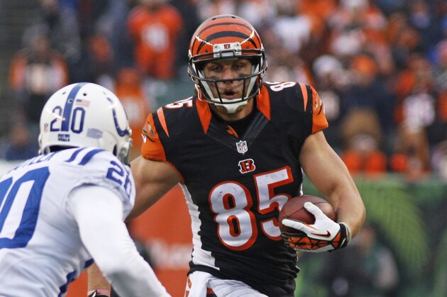Cincinnati Bengals tight end Tyler Eifert (85) runs against Indianapolis Colts free safety Darius Butler (20) during an NFL football game, Sunday, Dec. 8, 2013, in Cincinnati. (AP Photo/David Kohl)
