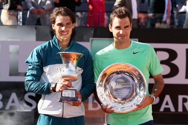 ROME, ITALY - MAY 19:  Rafael Nadal of Spain holds his winners trophy after his straight sets victory against Roger Federer of Switzerland in their final match during day eight of the Internazionali BNL d'Italia 2013 at the Foro Italico Tennis Centre  on May 19, 2013 in Rome, Italy.  (Photo by Clive Brunskill/Getty Images)