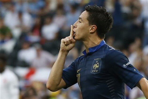 France's Samir Nasri celebrates scoring his side's first goal during the Euro 2012 soccer championship Group D match between France and England in Donetsk, Ukraine, Monday, June 11, 2012. (AP Photo/Kirsty Wigglesworth)