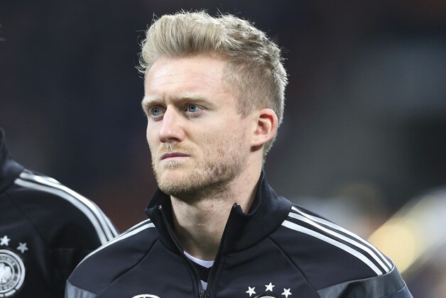 Germany forward Andre Schurrle stands prior to the start of a friendly soccer match between Italy and Germany at the San Siro  stadium in Milan, Italy, Friday, Nov. 15, 2013. (AP Photo/Antonio Calanni)