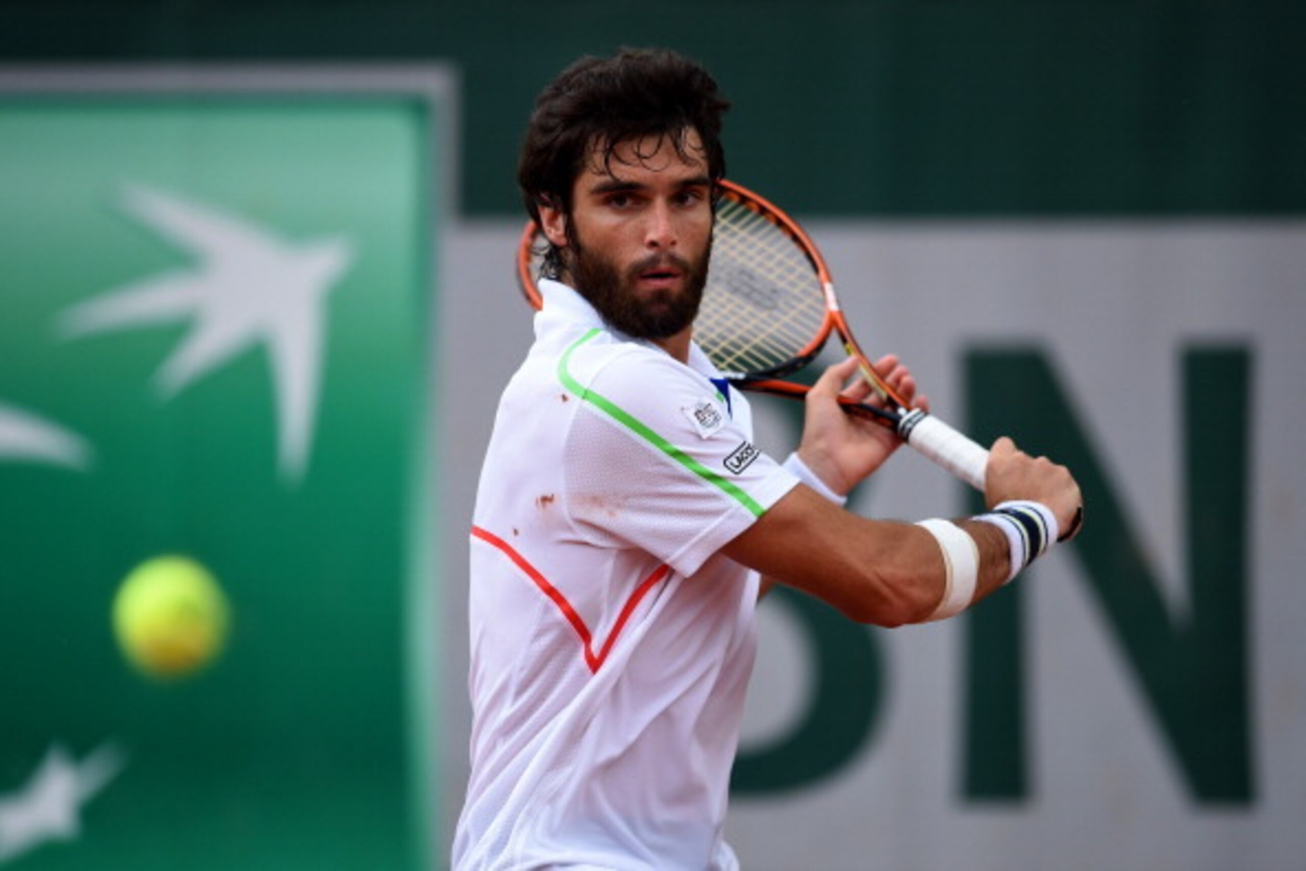 PARIS, FRANCE - MAY 26:  Pablo Andujar of Spain returns a shot during his men's singles match against Marin Cilic of Croatia on day two of the French Open at Roland Garros on May 26, 2014 in Paris, France.  (Photo by Matthias Hangst/Getty Images)
