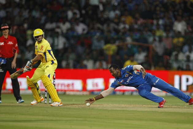 Mumbai Indians' bowler Dwayne Smith, right, drops a catch off Chennai Super Kings' batsman Subramanium Badrinath, not seen, during their Indian Premier League (IPL) playoff cricket match in Bangalore, India, Wednesday, May 23, 2012.  (AP Photo/Aijaz Rahi)
