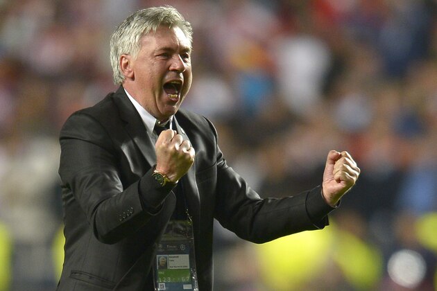 Real's coach Carlo Ancelotti gestures,  during the Champions League final soccer match between Atletico Madrid and Real Madrid in Lisbon, Portugal, Saturday, May 24, 2014. (AP Photo/Manu Fernandez)