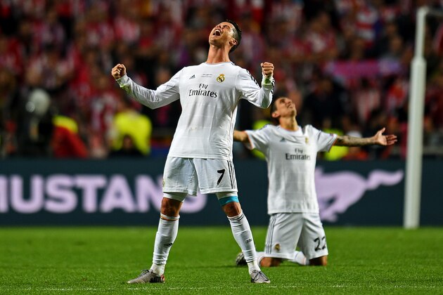 LISBON, PORTUGAL - MAY 24:  Cristiano Ronaldo of Real Madrid celebrates victory in the UEFA Champions League Final between Real Madrid and Atletico de Madrid at Estadio da Luz on May 24, 2014 in Lisbon, Portugal.  (Photo by Shaun Botterill/Getty Images)