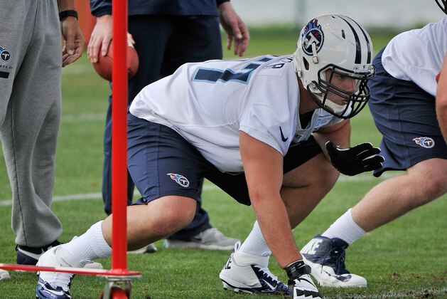 NASHVILLE, TN - MAY 16:  First round pick Taylor Lewan #77 works out during the Tennessee Titans rookie minicamp on May 16, 2014 in Nashville, Tennessee.  (Photo by Frederick Breedon/Getty Images)