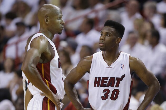 Miami Heat guard Norris Cole (30) talks to Ray Allen during the first half of Game 3 in the NBA basketball Eastern Conference finals playoff series against the Indiana Pacers, Saturday, May 24, 2014, in Miami. (AP Photo/Lynne Sladky)