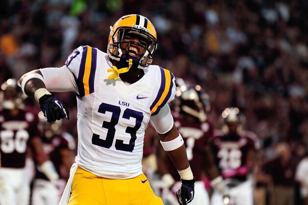STARKVILLE, MS - OCTOBER 05:  Jeremy Hill #33 of the LSU Tigers celebrates a touchdown against the Mississippi State Bulldogs during a game at Davis Wade Stadium on October 5, 2013 in Starkville, Mississippi.  (Photo by Stacy Revere/Getty Images)