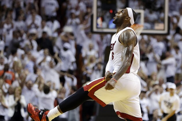 Miami Heat forward LeBron James celebrates late in the second half of Game 3 in the NBA basketball Eastern Conference finals playoff series against the Indiana Pacers, Saturday, May 24, 2014, in Miami. The Heat defeated the Pacers 99-87. (AP Photo/Lynne Sladky)