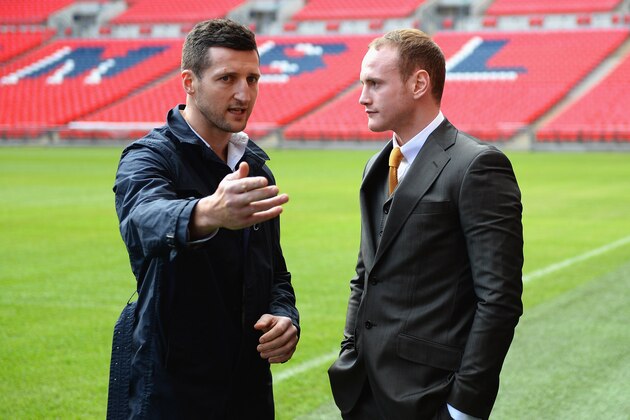LONDON, ENGLAND - MARCH 10:  Carl Froch and George Groves argue as tempers flare up after the Press Conference at Wembley Stadium on March 10, 2014 in London, England.  (Photo by Laurence Griffiths/Getty Images)