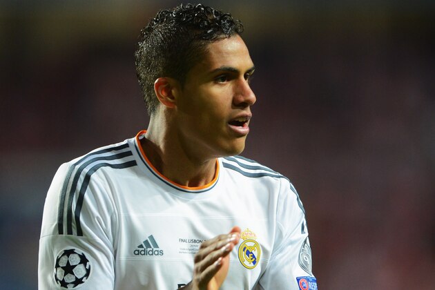 LISBON, PORTUGAL - MAY 24:  Raphael Varane of Real Madrid applauds during the UEFA Champions League Final between Real Madrid and Atletico de Madrid at Estadio da Luz on May 24, 2014 in Lisbon, Portugal.  (Photo by Michael Regan/Getty Images)