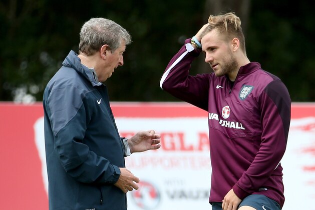 VALE DO LOBO, ALGARVE, PORTUGAL - MAY 21:  Manager Roy Hodgson talks with Luke Shaw during a training session at the England pre-World Cup Training Camp at the Vale Do Lobo Resort on May 21, 2014 in Vale Do Lobo, Algarve, Portugal.  (Photo by Richard Heathcote/Getty Images)