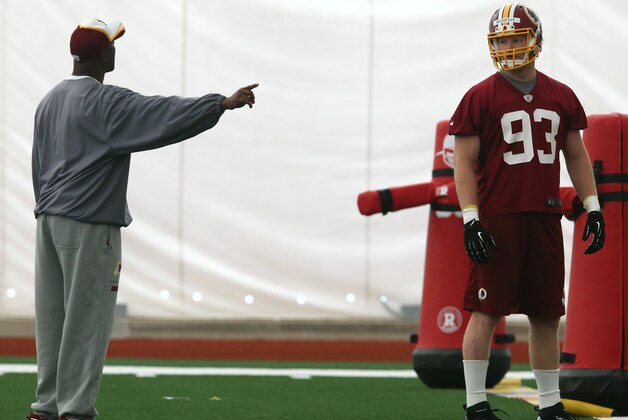 ASHBURN, VA - MAY 17:  Trent Murphy #93 works out during Washington Redskins rookie minicamp at Redskins Park on May 17, 2014 in Ashburn, Virginia.  (Photo by Mark Wilson/Getty Images)