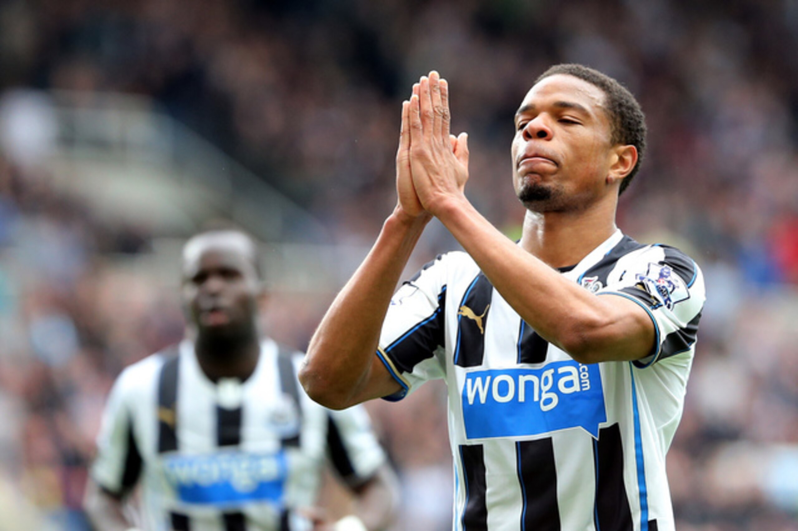 Newcastle United's Loic Remy celebrates his goal  during their English Premier League soccer match against Cardiff City at St James' Park, Newcastle, England, Saturday, May 3, 2014. (AP Photo/Scott Heppell)