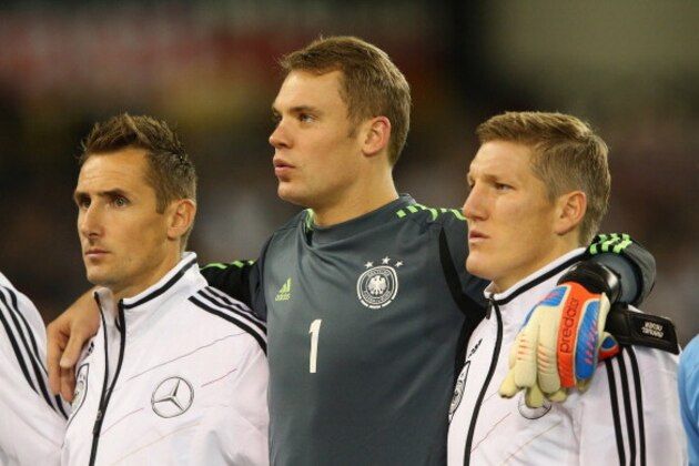 DUBLIN, IRELAND - OCTOBER 12:  Miroslav Klose, Manuel Neuer and Bastian Schweinsteiger of Germany line up priorto the FIFA 2014 World Cup Qualifier Group C match between Republic of Ireland and Germany at the Aviva Stadium on October 12, 2012 in Dublin, Ireland.  (Photo by Alex Livesey/Getty Images)