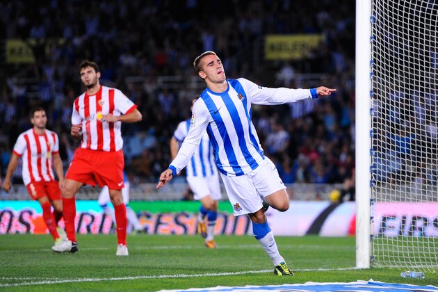 SAN SEBASTIAN, SPAIN - OCTOBER 27:  Antoine Griezmann of Real Sociedad de Futbol celebrates after scoring his team's second goal during the La Liga match between Real Sociedad de Futbol and UD Almeria at Estadio Anoeta on October 27, 2013 in San Sebastian, Spain.  (Photo by David Ramos/Getty Images)