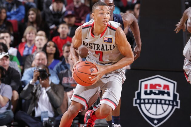 PORTLAND, OR - APRIL 20: Dante Exum #7 on the World Select Team drives against the USA Junior Select Team during the game on April 20, 2013 at the Rose Garden Arena in Portland, Oregon. NOTE TO USER: User expressly acknowledges and agrees that, by downloading and or using this photograph, User is consenting to the terms and conditions of the License Agreement. Mandatory Copyright Notice: Copyright 2012 (Photo by Sam Forencich)