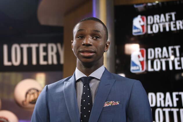 Top NBA draft prospect Andrew Wiggins of Kansas prepares for an interview during the NBA draft lottery in New York, Tuesday, May 20, 2014.  (AP Photo/Kathy Willens)