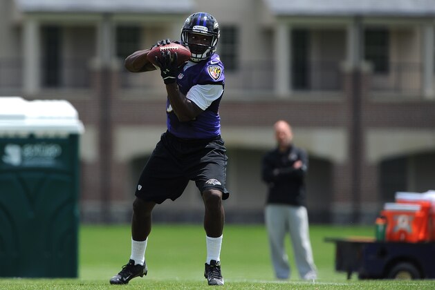 BALTIMORE, MD - MAY 17:  Running back Lorenzo Taliaferro #34 of the Baltimore Ravens participates in the Baltimore Ravens Rookie Minicamp on May 17, 2014 in Baltimore, Maryland.  (Photo by Larry French/Getty Images)