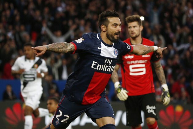 Paris Saint Germain's Ezequiel Lavezzi form Argentina, celebrates the opening goal during a French league one soccer match between Paris-Saint-Germain and Rennes at Parc des Princes stadium in Paris, Wednesday, May 7, 2014. Paris Saint Germain clinhed its second straight French league title on Wednesday after rival Monaco drew 1-1 against French Cup holder Guingamp. (AP Photo/Michel Euler)