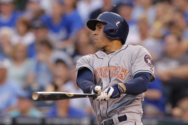 Houston Astros' George Springer hits a two-run double off Kansas City Royals starting pitcher Yordano Ventura during the second inning of a baseball game at Kauffman Stadium in Kansas City, Mo., Monday, May 26, 2014. (AP Photo/Orlin Wagner)