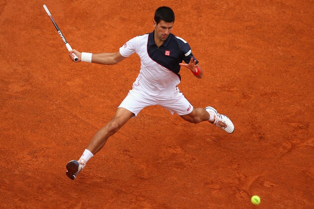 ROME, ITALY - MAY 18:  Novak Djokovic of Serbia in action in his match against Rafael Nadal of Spain in the final during day eight of the Internazionali BNL d'Italia tennis 2014 on May 18, 2014 in Rome, Italy.  (Photo by Julian Finney/Getty Images)