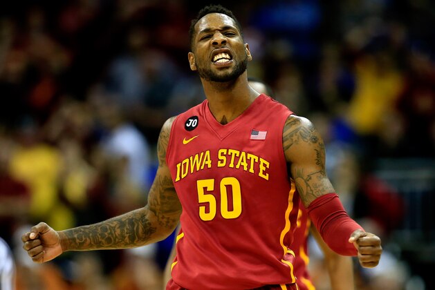 KANSAS CITY, MO - MARCH 14:  DeAndre Kane #50  of the Iowa State Cyclones celebrates as Iowa State Cyclones defeats Kansas Jayhawks 94-83 to win the Big 12 Basketball Tournament semifinal game at Sprint Center on March 14, 2014 in Kansas City, Missouri.  (Photo by Jamie Squire/Getty Images)