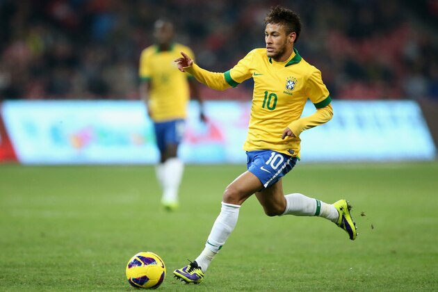 BEIJING, CHINA - OCTOBER 15:  Neymar of Brazil controls the ball during the international friendly match between Brazil and Zambia at Beijing National Stadium on October 15, 2013 in Beijing, China.  (Photo by Feng Li/Getty Images)